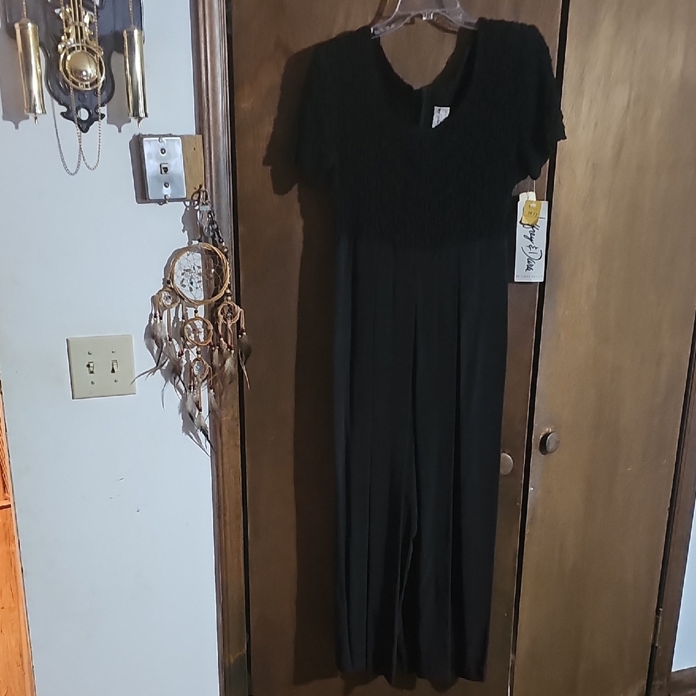 Jeffery And Dara Black Short Sleeve Jumpsuit. NWT